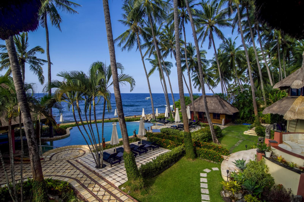Stunning views at Bali Villa Dive Resort; tropical garden, pool and ocean view, perfect for scuba divers